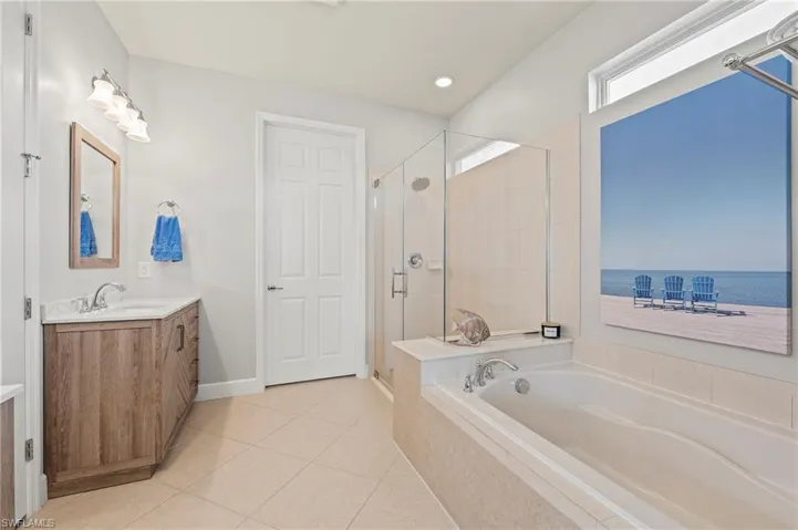 28196 Jewel Fish Ln Bonita Springs FL 34135 - Separate tub and shower and a walk in closet.