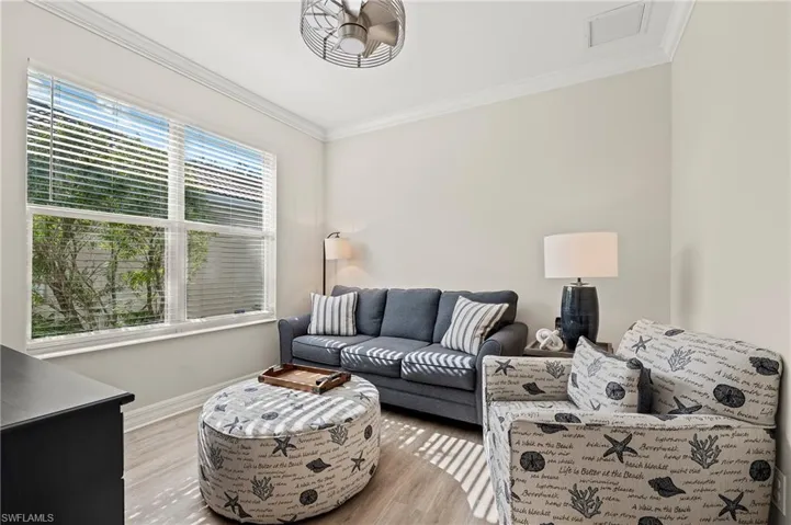 28196 Jewel Fish Ln Bonita Springs FL 34135 - The den is an ideal secondary television room or a great spot for overflow guests.