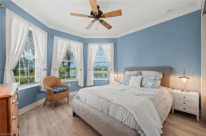 28196 Jewel Fish Ln Bonita Springs FL 34135 - The wrap around water view can be enjoyed from bedroom 2