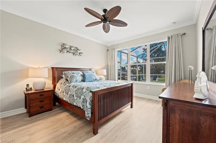 28196 Jewel Fish Ln Bonita Springs FL 34135 - Owner's bedroom with luxury vinyl flooring