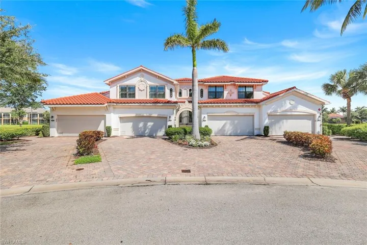 Mediterranean / spanish-style house featuring stucco siding, driveway, and a tile roof