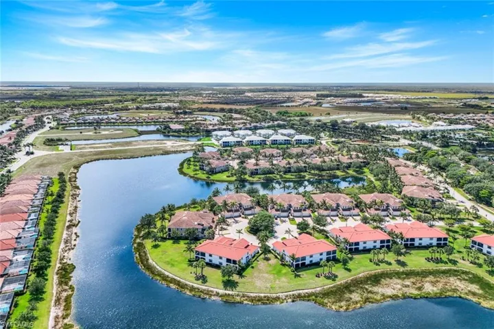 Aerial view of residential area with a large body of water