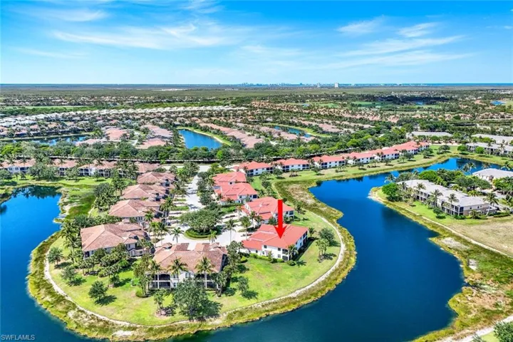 Aerial view of residential area with a nearby body of water