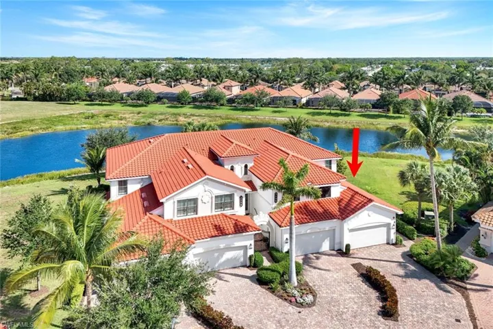 Aerial view of residential area with a nearby body of water