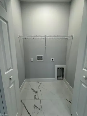 Laundry area with electric dryer hookup and hookup for a washing machine