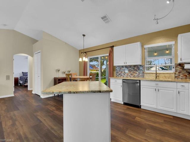 Open concept kitchen living/ dining/ kitchen