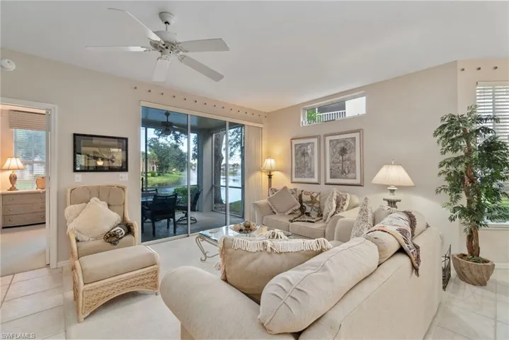 Living area featuring tile patterned flooring and plenty of natural light