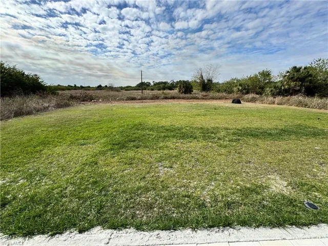 View of yard with a rural view