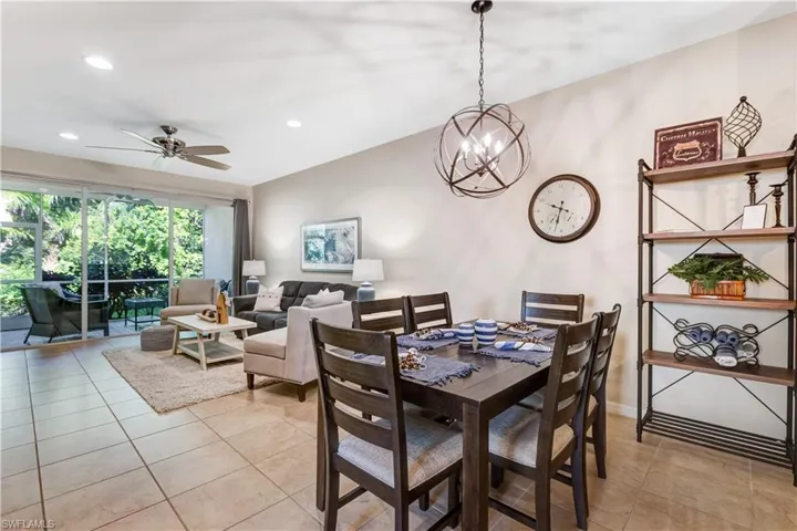 The property features an open living and dining area with tiled flooring