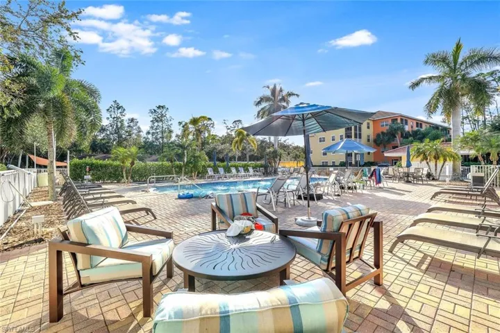 View of patio / terrace featuring a community pool