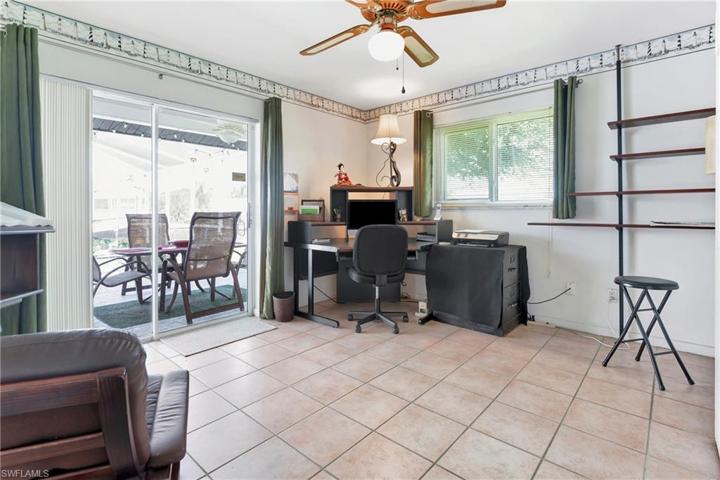 Guest Bedroom with access to lanai and waterview makes a perfect home office