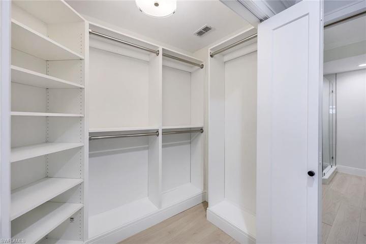 Walk-In Master Closet w/ Custom Shelving