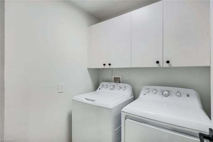 Laundry Room w/ Cabinetry for Storage