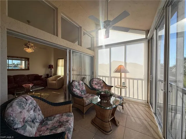Sunroom with vaulted ceiling