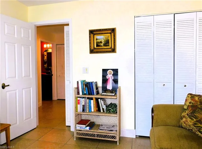 Sitting room with tile patterned flooring