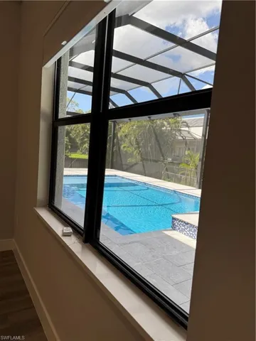 View of pool All doors and windows are impact-resistant
