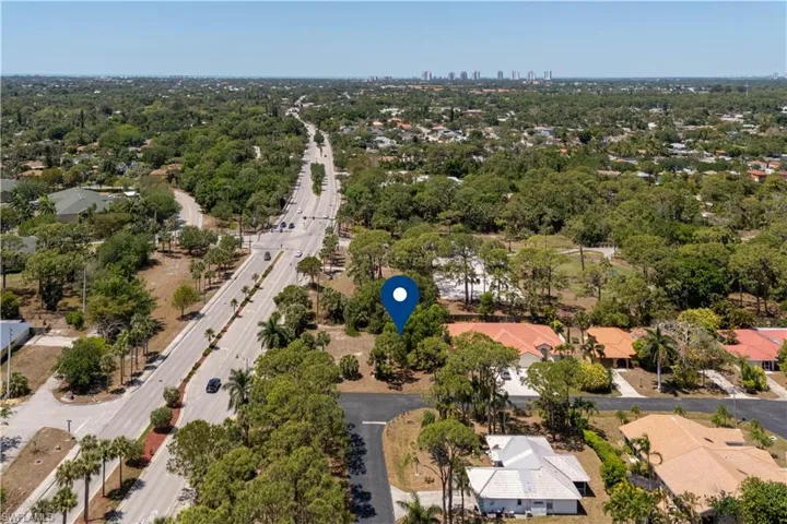 Birds eye view of property with a residential view