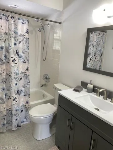 The updated Guest Bath has new single vanity, tiled tub/shower combination and hall linen closet.
