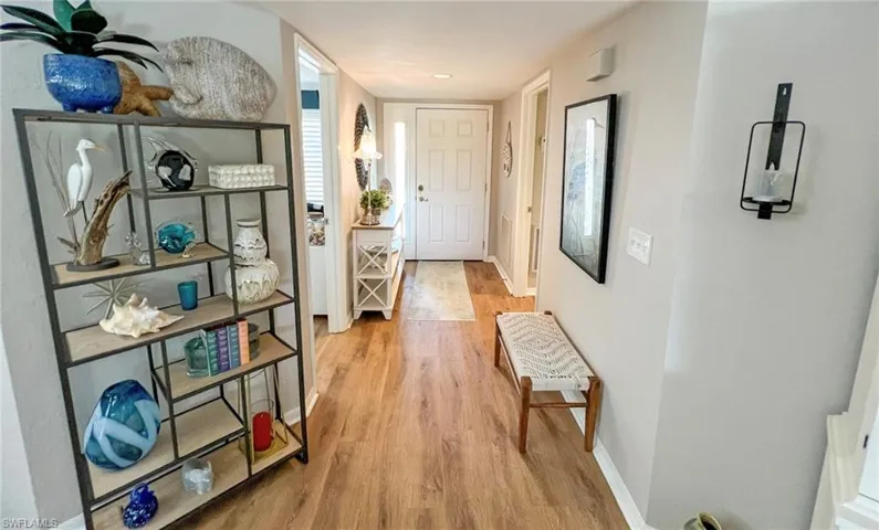 Hallway featuring light hardwood / wood-style floors