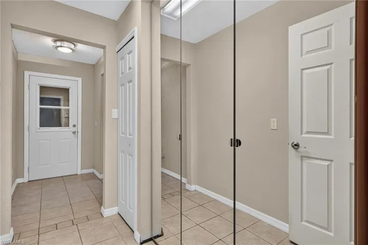 Pantry with Beautiful Mirrored Doors