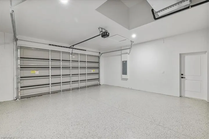Garage featuring electric panel