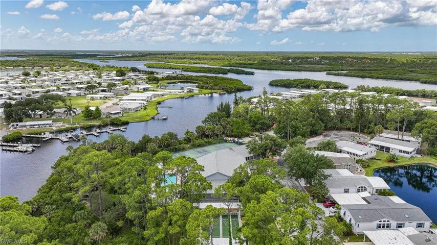 Aerial perspective featuring a waterfront community with extensive water access