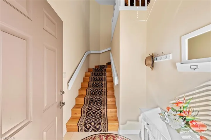 Stairs with tile patterned flooring