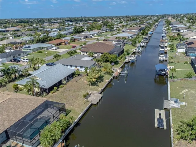 Aerial view of the property highlighting the residential neighborhood and scenic gulf access.