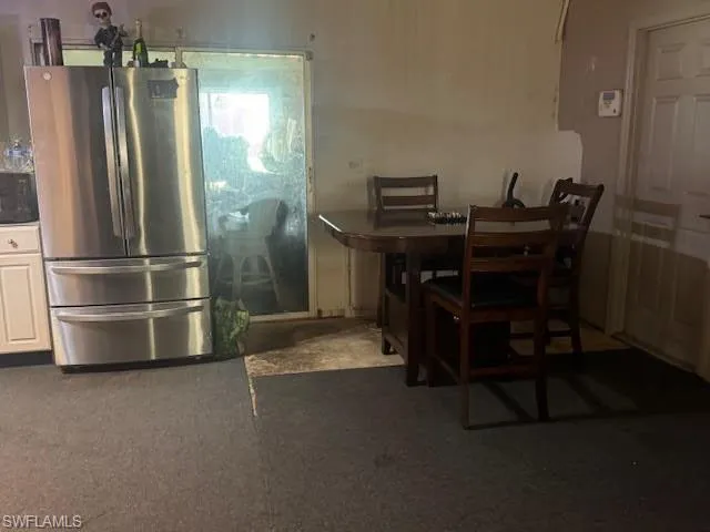 Dining area featuring carpet flooring