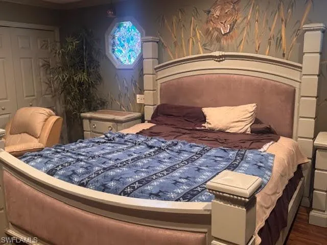 Bedroom featuring wood finished floors