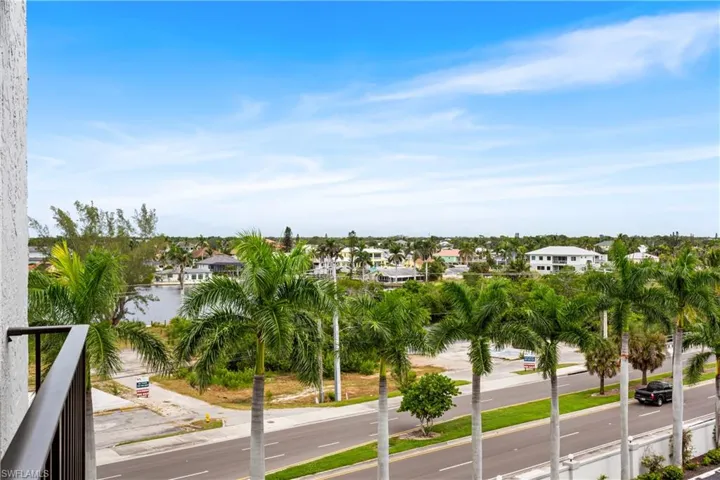 View of bay and swaying palms from the guest bedroom and front door!