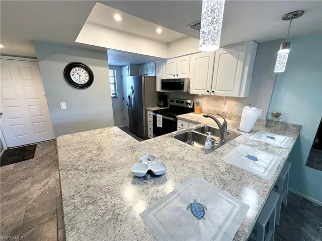 Granite countertops and stainless steel appliances