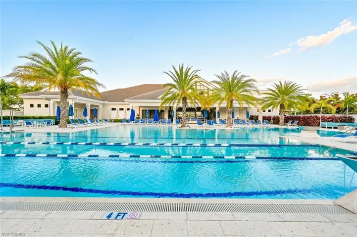 Community pool with a patio area