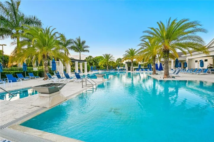 Community pool featuring a patio