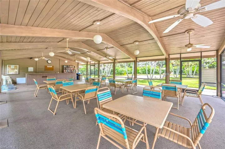 View of patio / terrace with outdoor dining space and a ceiling fan
