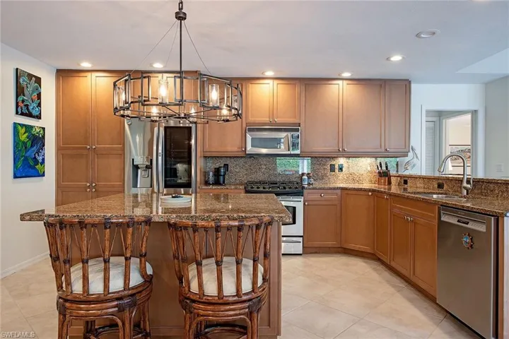 702  Willowwood  LN, Naples, FL 34108