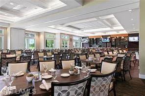 Dining room with beamed ceiling and coffered ceiling