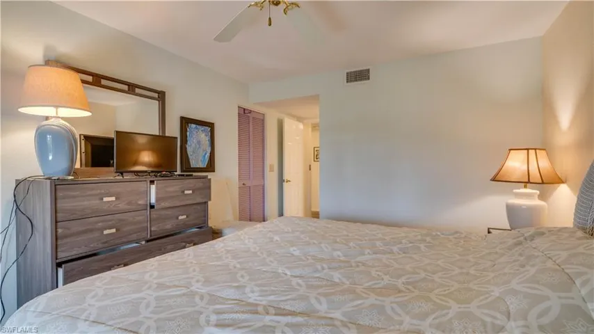 Bedroom with a closet and ceiling fan