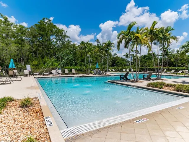 View of swimming pool featuring pool water feature