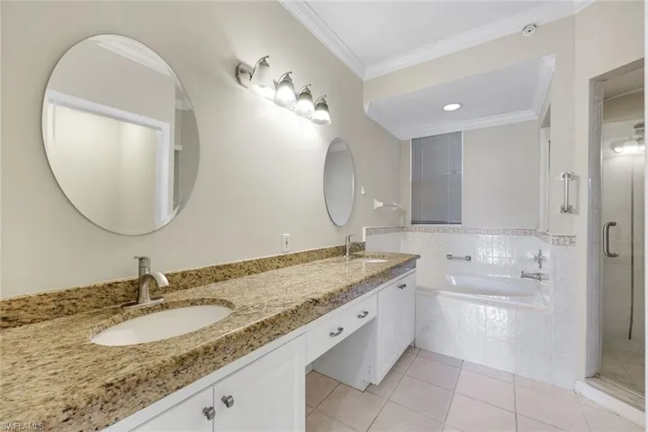 Master Bathroom - Dual Sinks, Jetted Tub, and Shower.