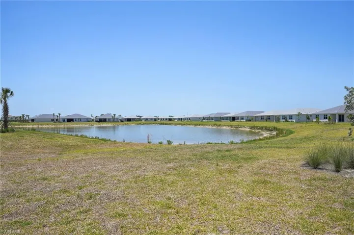 Water view featuring nearby suburban area