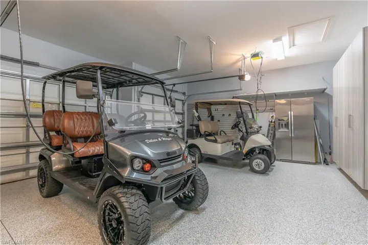 Garage with stainless steel fridge
