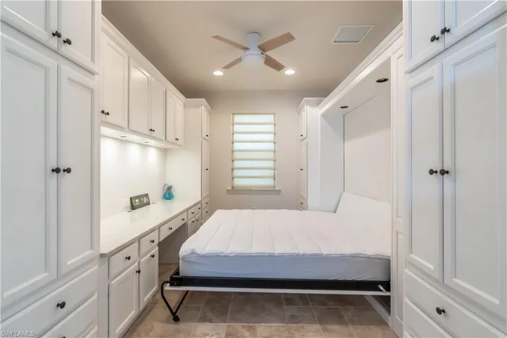Bedroom featuring crown molding, recessed lighting, and ceiling fan