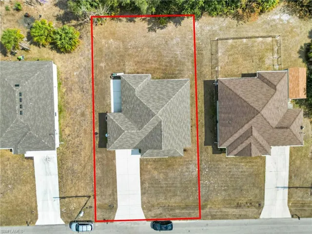Aerial overview of property's location featuring property parcel outlined