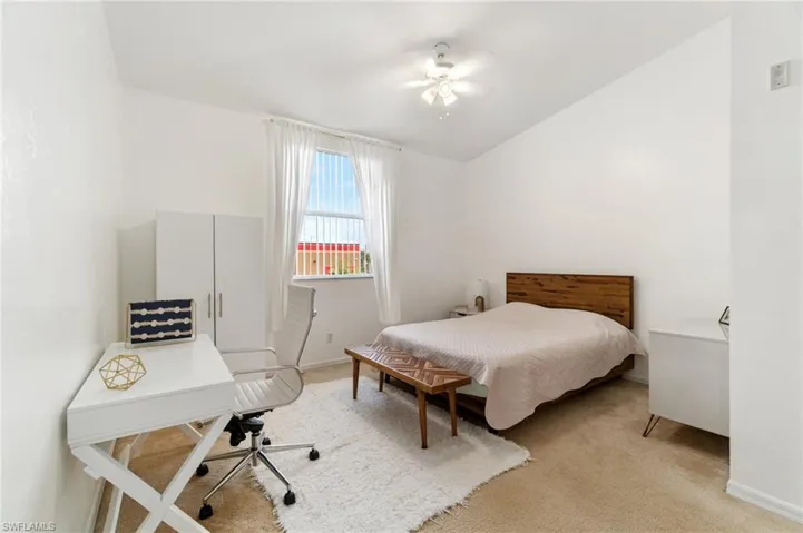 Spacious primary bedroom featuring walk-in closet.