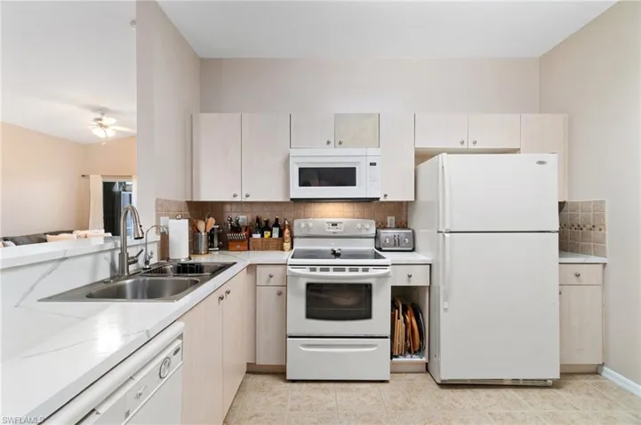 Cabinet door in lower kitchen cab is missing. See photo for reference.