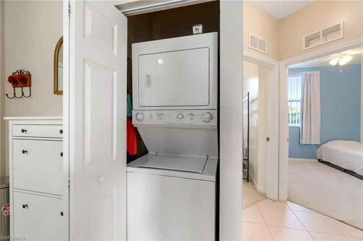 Washer/Dryer conveniently located within unit.