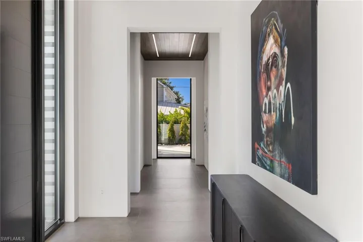 Hall with concrete flooring