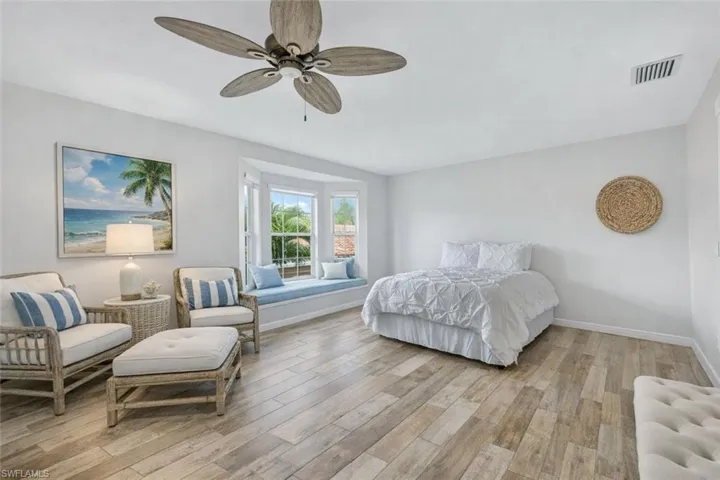 VIRTUALLY STAGED to show Modern Coastal Bedroom
