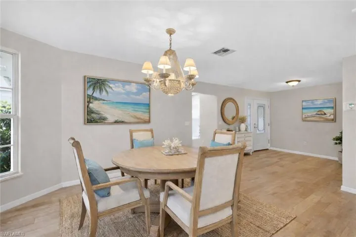 VIRTUALLY STAGED to show Modern Coastal Dining Room